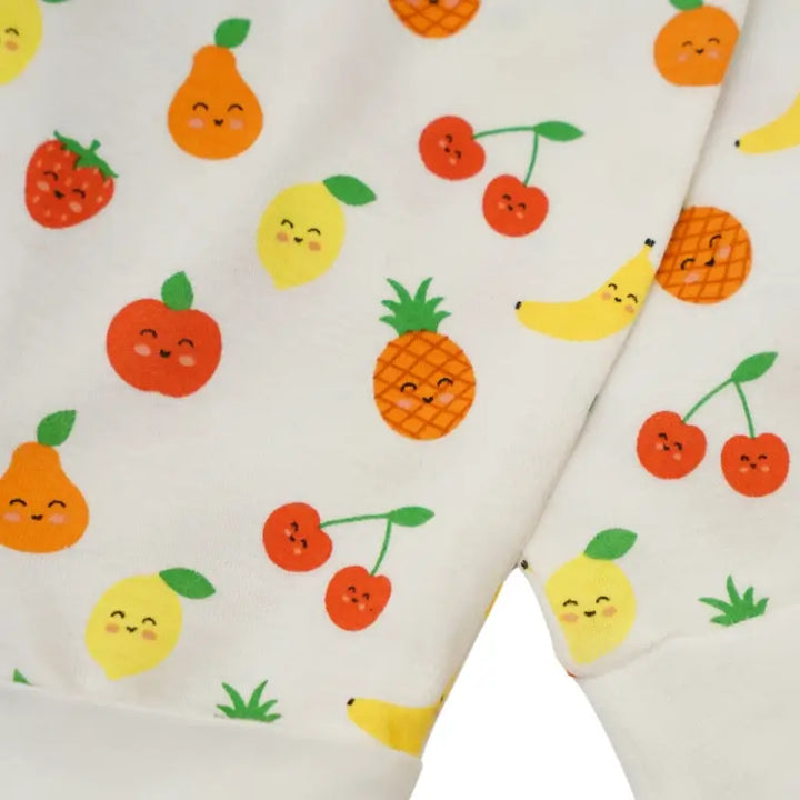 Colorful fruit prints on white baby fabric.